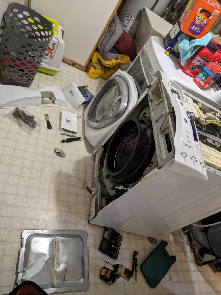 Laundry appliance opened for service